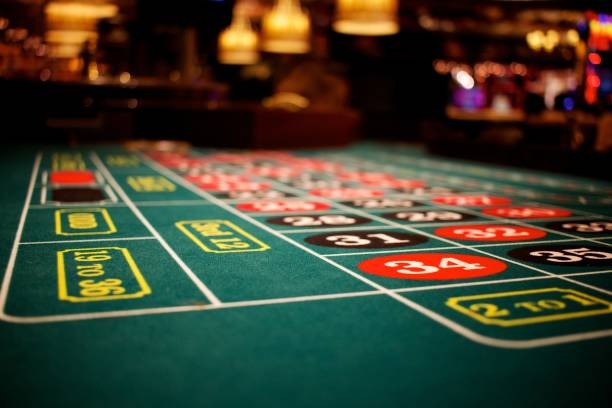 Live dealer dealing cards at a baccarat table on yoda4d platform